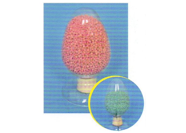 Magnesium sulfate monohydrate colored particles